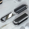 Espejo de Viaje MirrorFlex con Cepillo de Pelo | Plegable y Compacto | Estilo Práctico en Movimiento