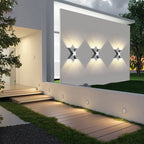 Foco exterior LED moderno e impermeable en diseño X para iluminación de fachadas