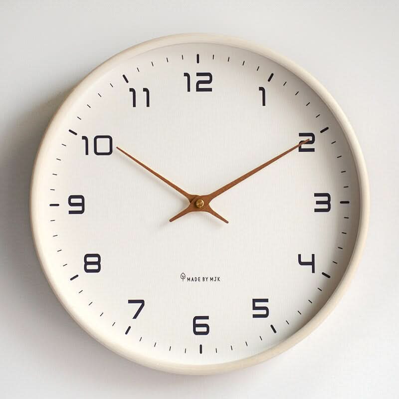 Reloj de pared de madera escandinavo Claryo Diseño minimalista