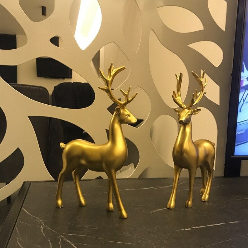 Figuras de Ciervo Dorado en Pareja