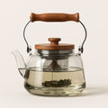 Tetera de Vidrio Zoie con Infusor – Hervidor de Borosilicato Resistente al Calor de 1000ml con Mango de Madera