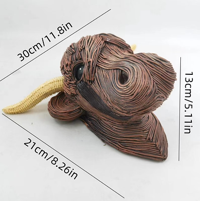 Escultura de una vaca para colgar en la pared