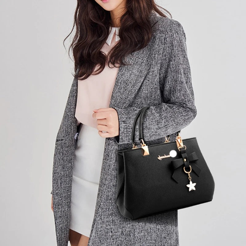 Bolso messenger para mujeres con charm de flores
