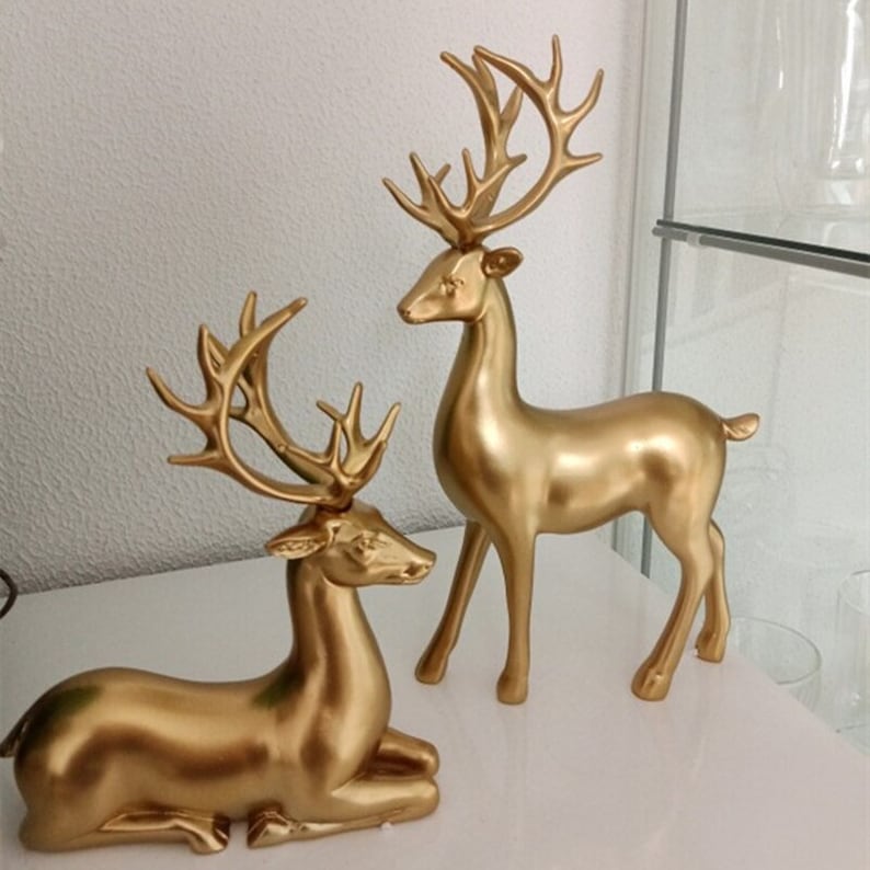 Figuras de Ciervo Dorado en Pareja